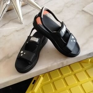 PUMA Black Sandals with Star Details